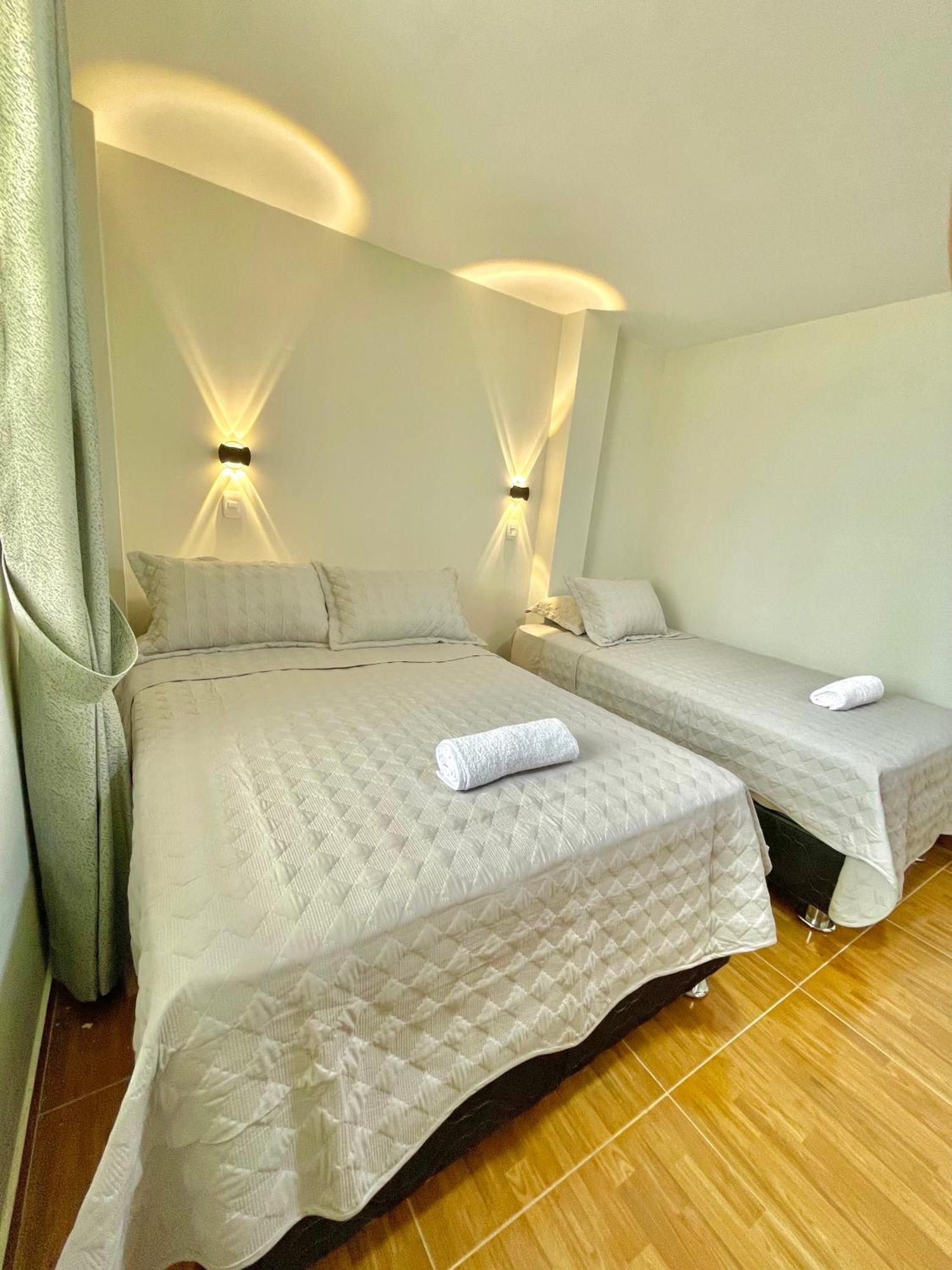 Jultom Inn Hotel & Suites トルヒーリョ エクステリア 写真